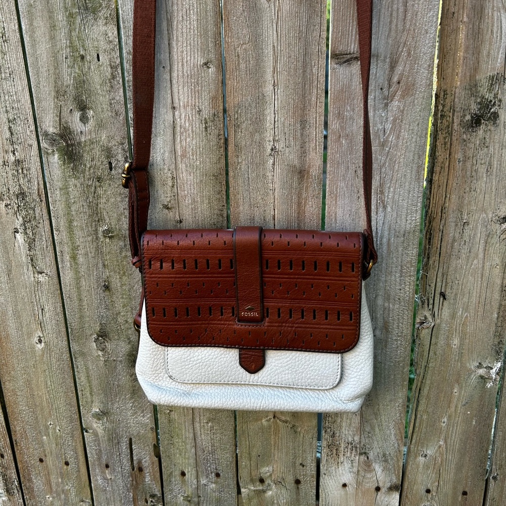 White and brown leather crossbody bag by Fossil.